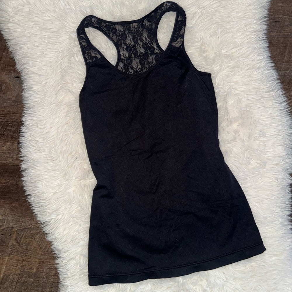 Elegant Black Sleeveless Top with Floral Design